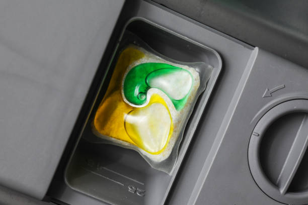 cleaning a soap dispenser drawer from laundry machine